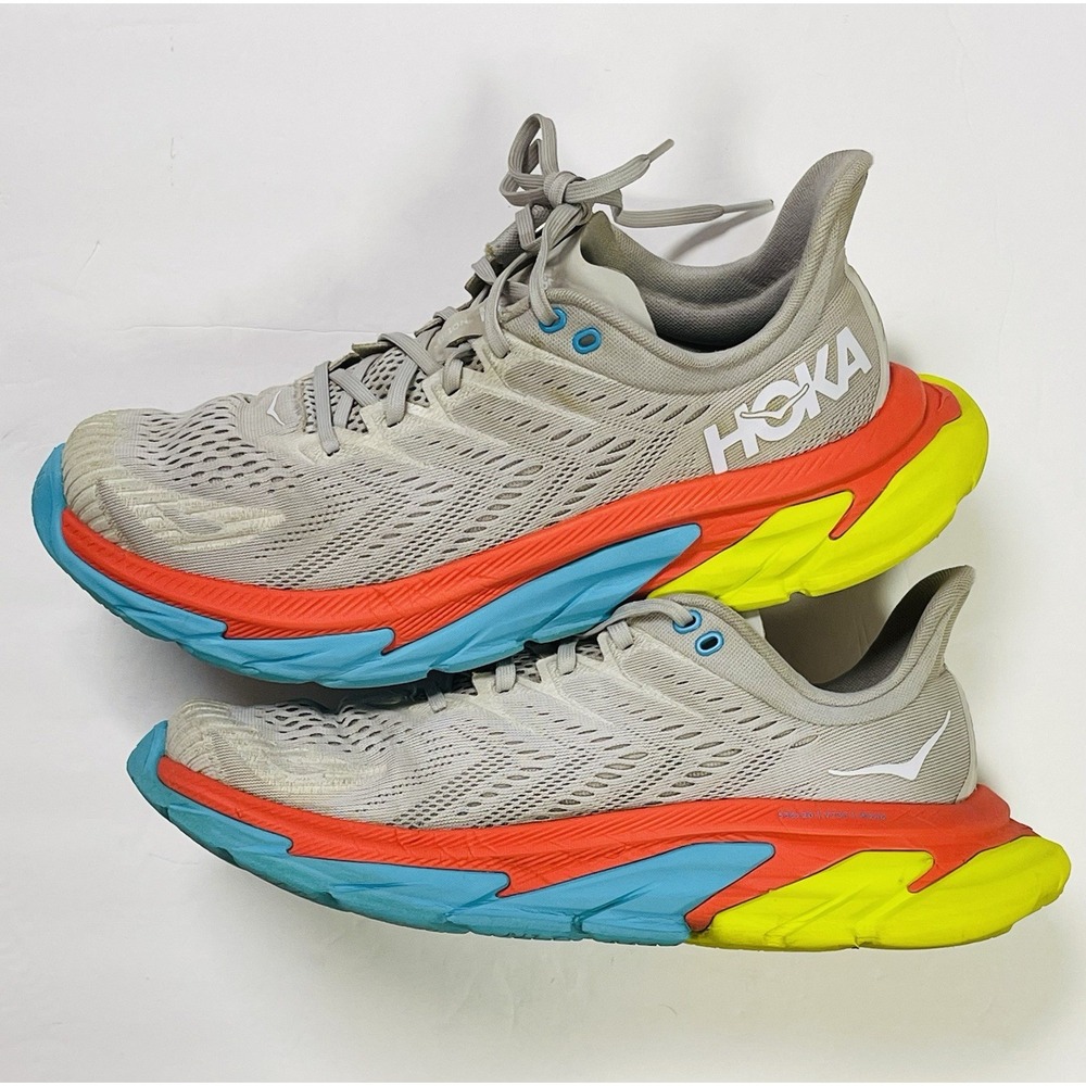 Hoka One One Gray Athletic Shoes with Red, Blue, and Yellow Accents